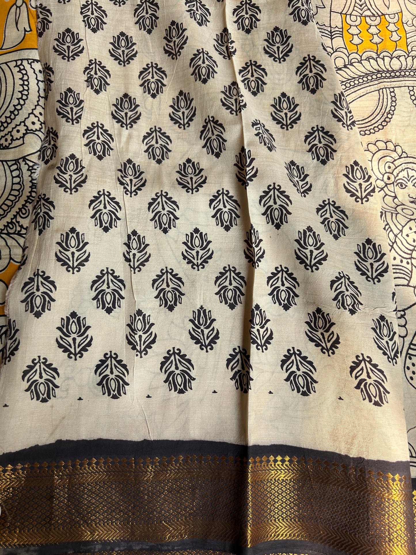 Yellow chennur silk kalamkari saree with Nizam border