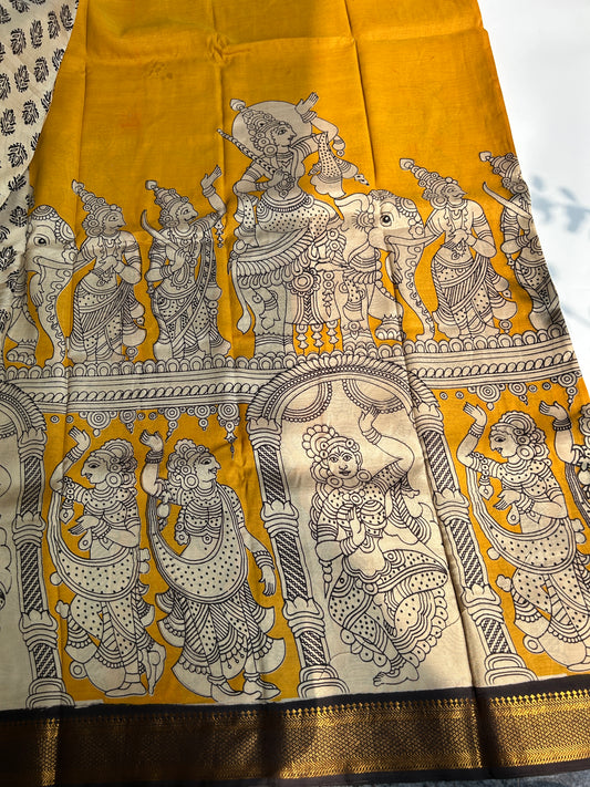 Yellow chennur silk kalamkari saree with Nizam border