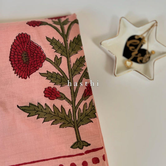 Peach blockprint mul cotton saree with big red floral motifs