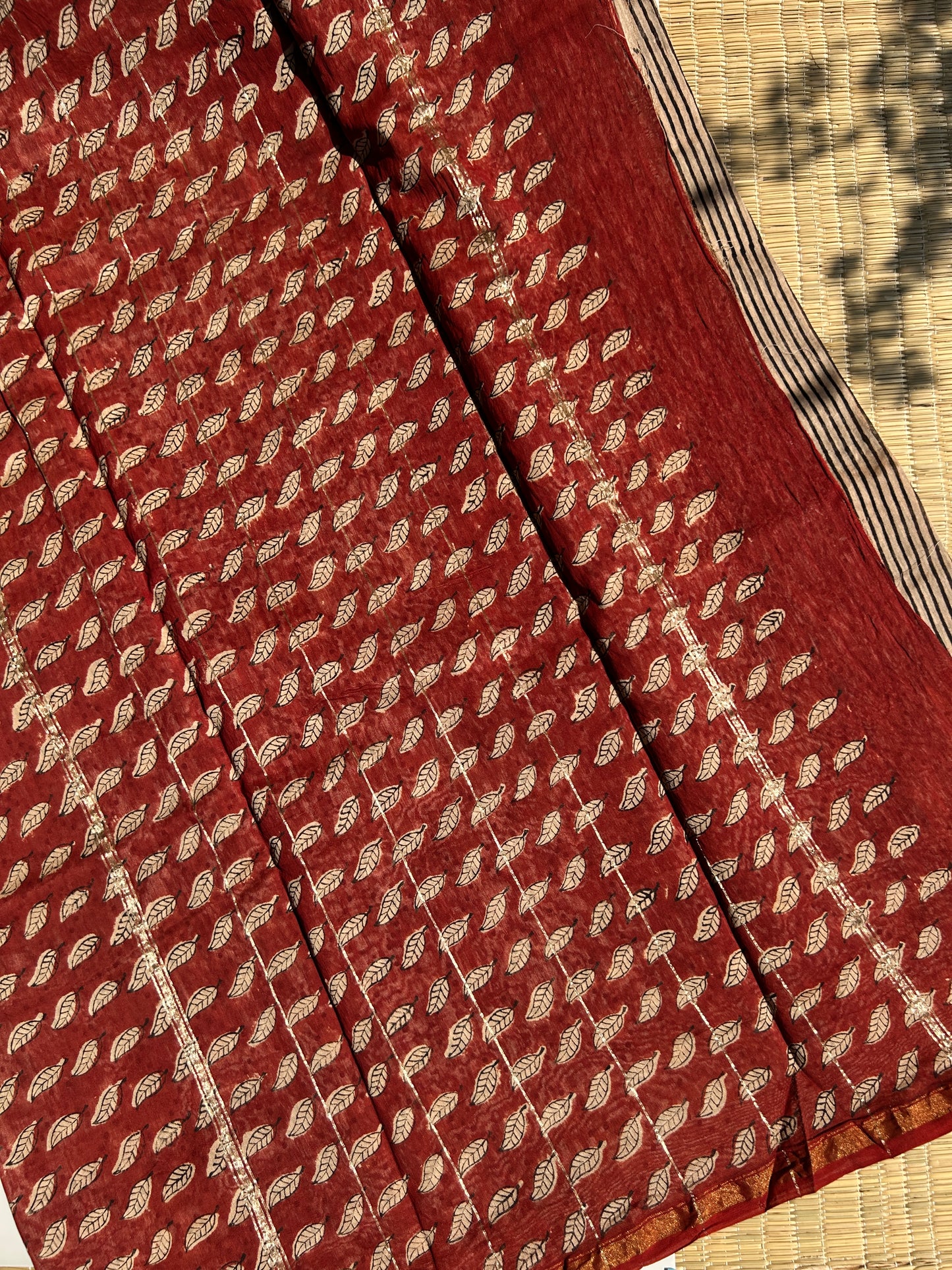 Cream Chanderi silk saree with black stripes and red border