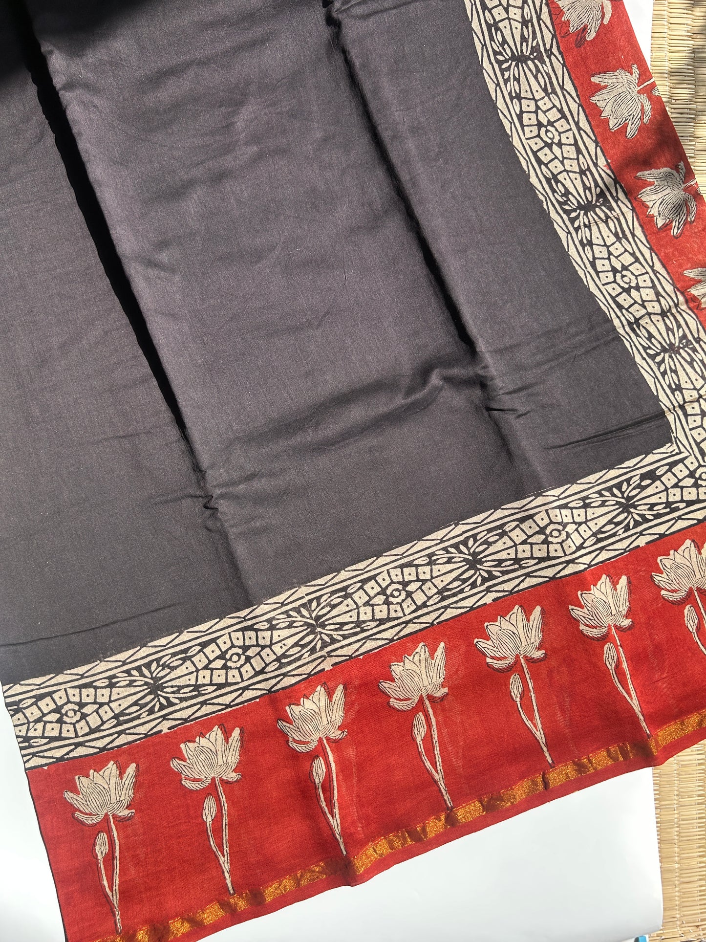 Black Chanderi silk saree with red floral border