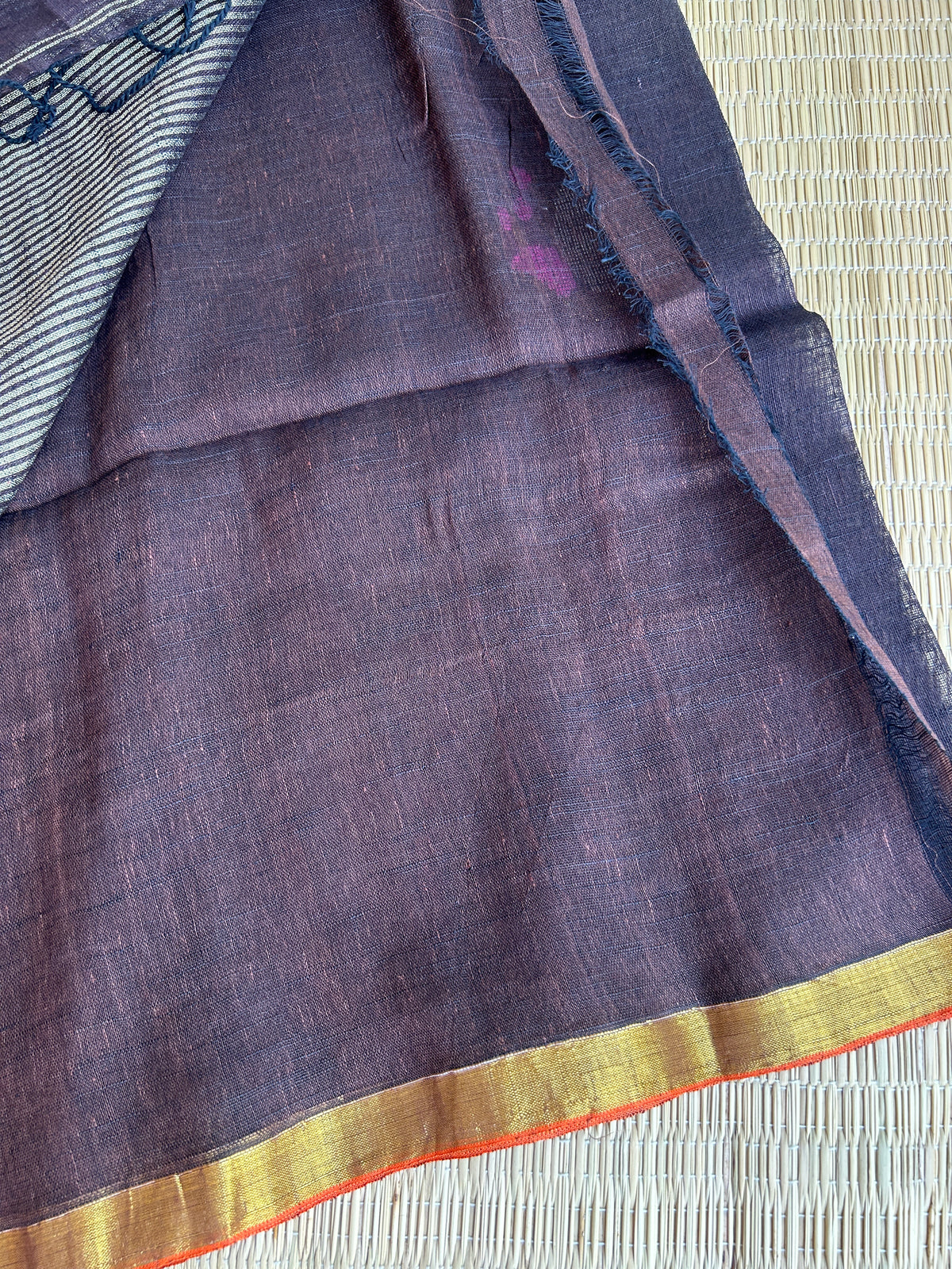 Dark chocolate Brown linen jamdani saree with floral motifs and golden border