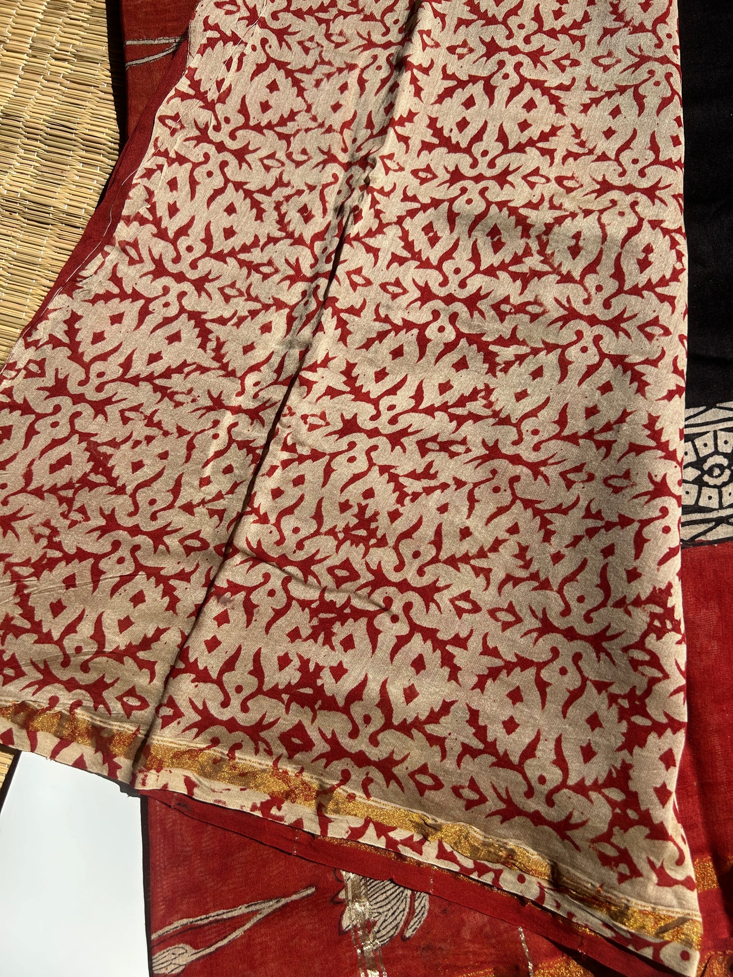 Black Chanderi silk saree with red floral border