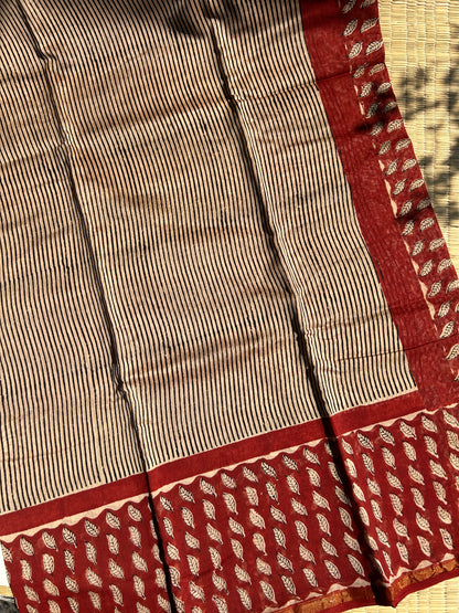 Cream Chanderi silk saree with black stripes and red border