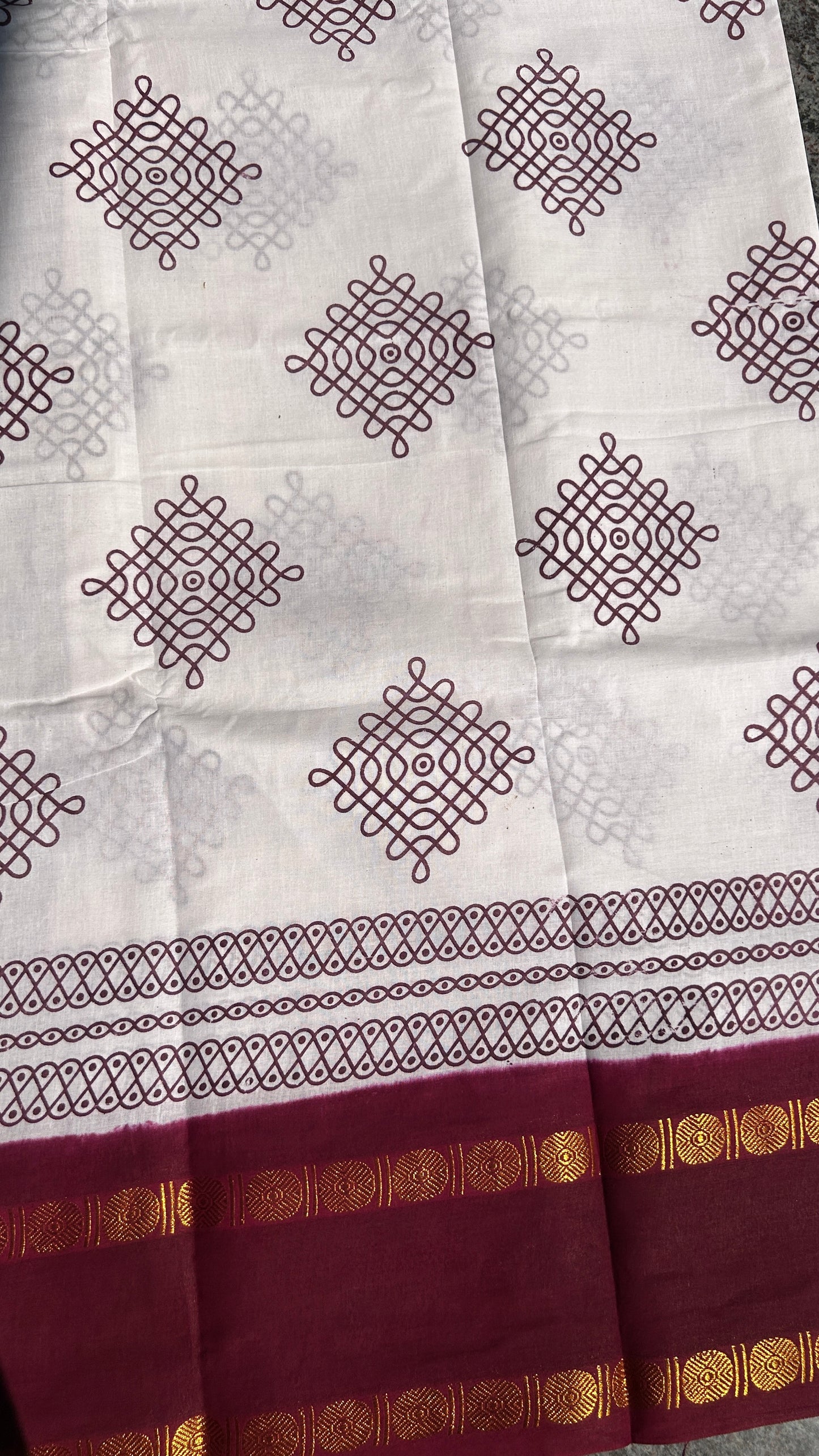 White & Maroon Madurai sungudi cotton saree with kolam motif