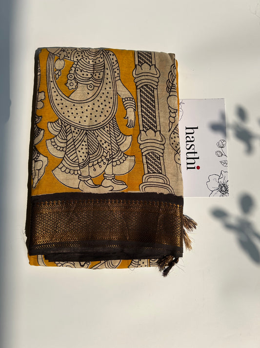 Yellow chennur silk kalamkari saree with Nizam border