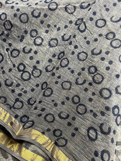 Beige Kota doria saree with mango motifs