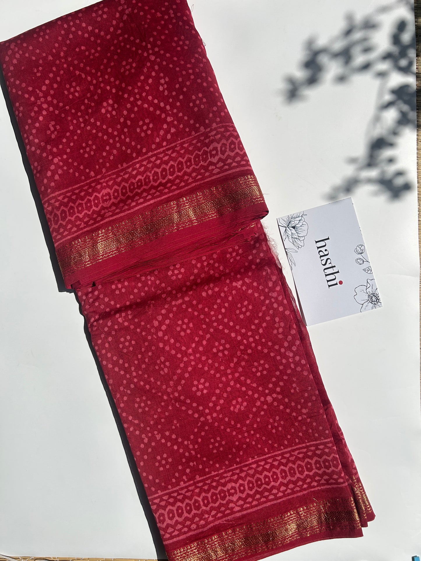Red Maheshwari silk saree with geometric dots pattern