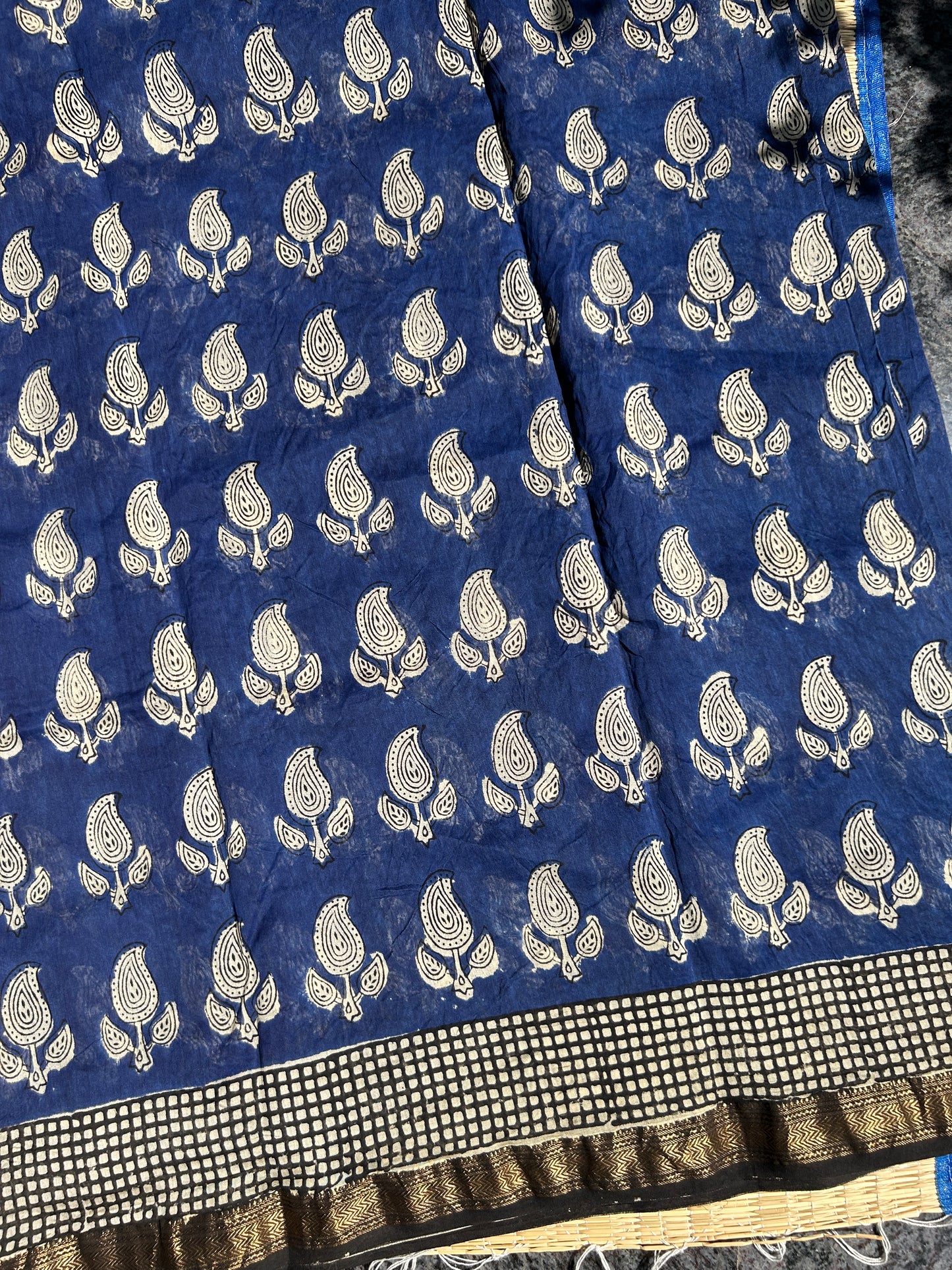 Blue Maheshwari silk saree with white motifs