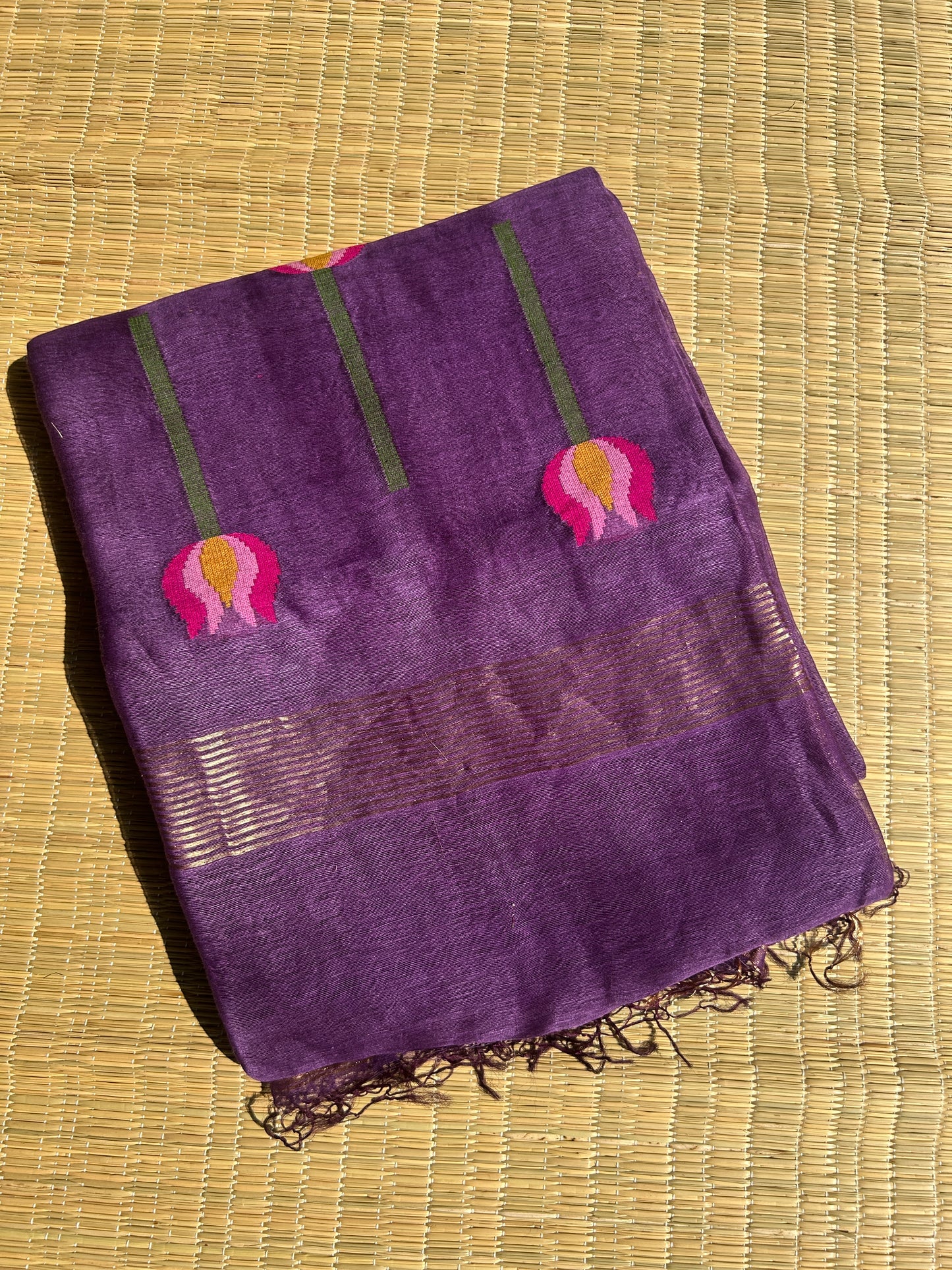 Purple silk linen jamdani saree with lotus motifs