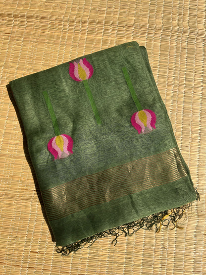 Green silk linen jamdani saree with lotus motifs