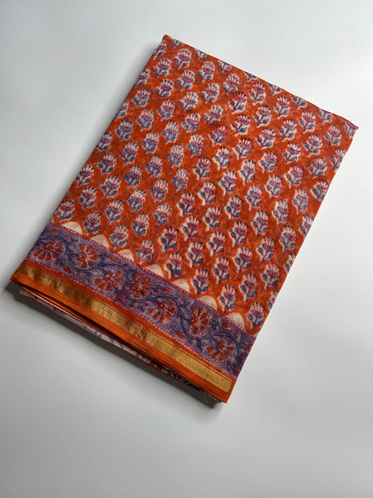 Orange Chanderi silk saree with small florals