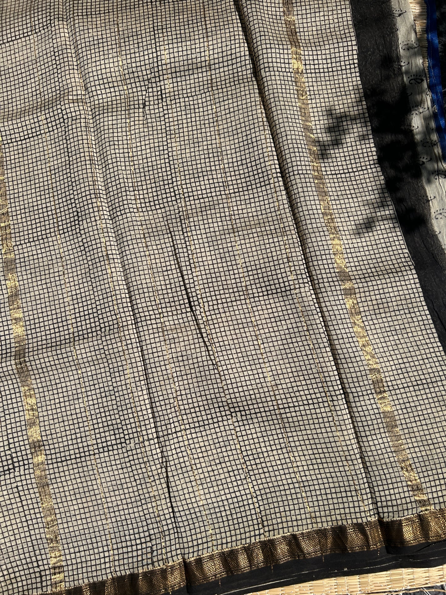 Blue Maheshwari silk saree with white motifs