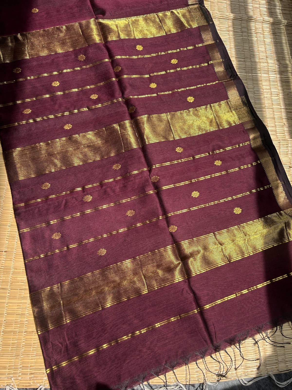Brown Maheshwari handloom saree with flower motifs