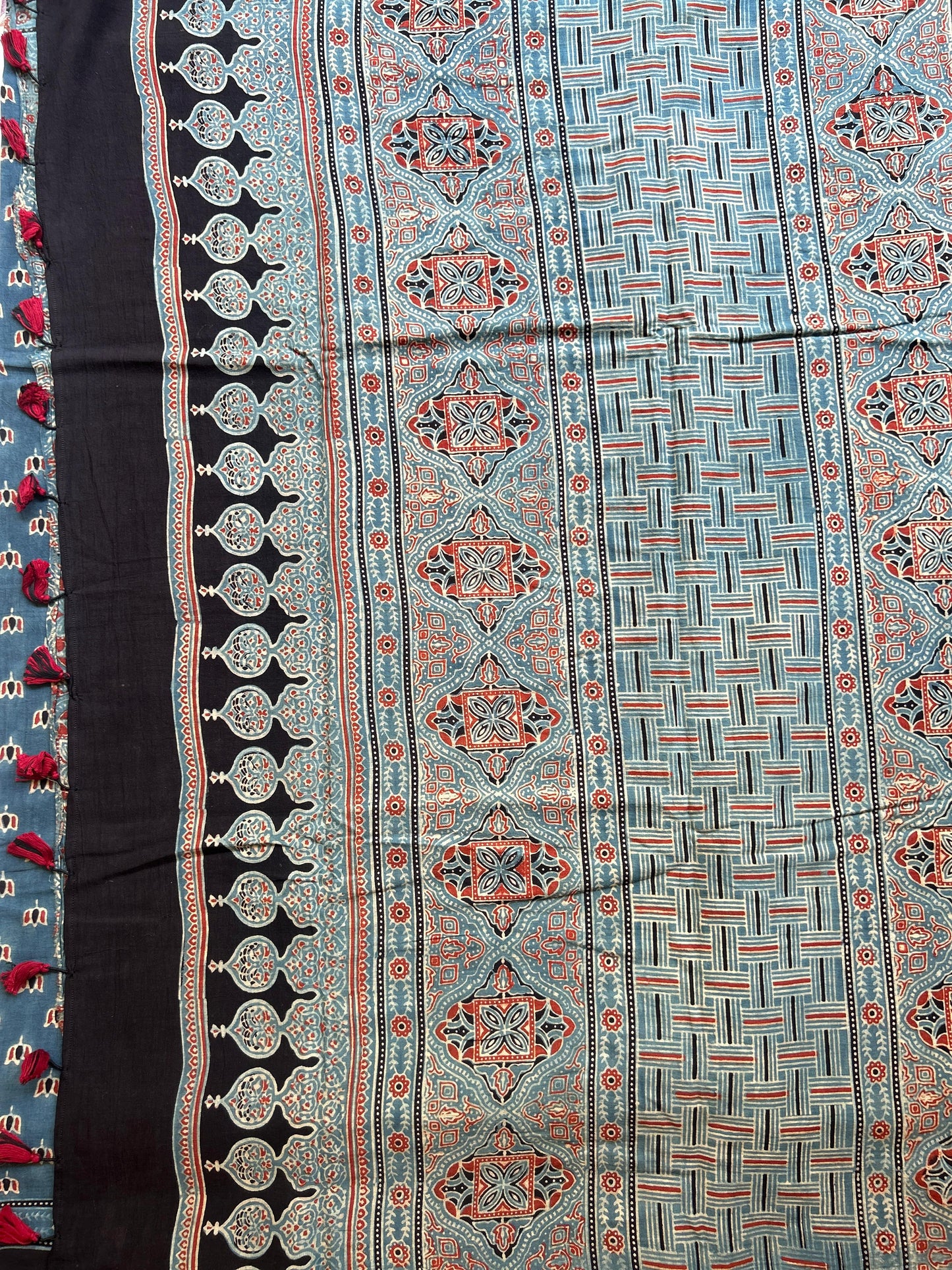 Natural dyed indigo Ajrakh cotton saree with lotus motifs