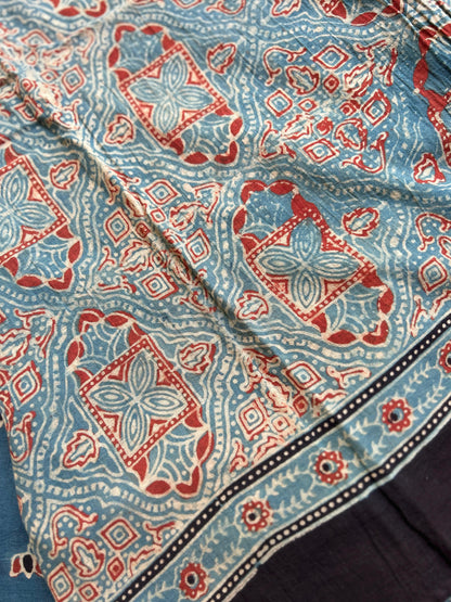 Natural dyed indigo Ajrakh cotton saree with lotus motifs