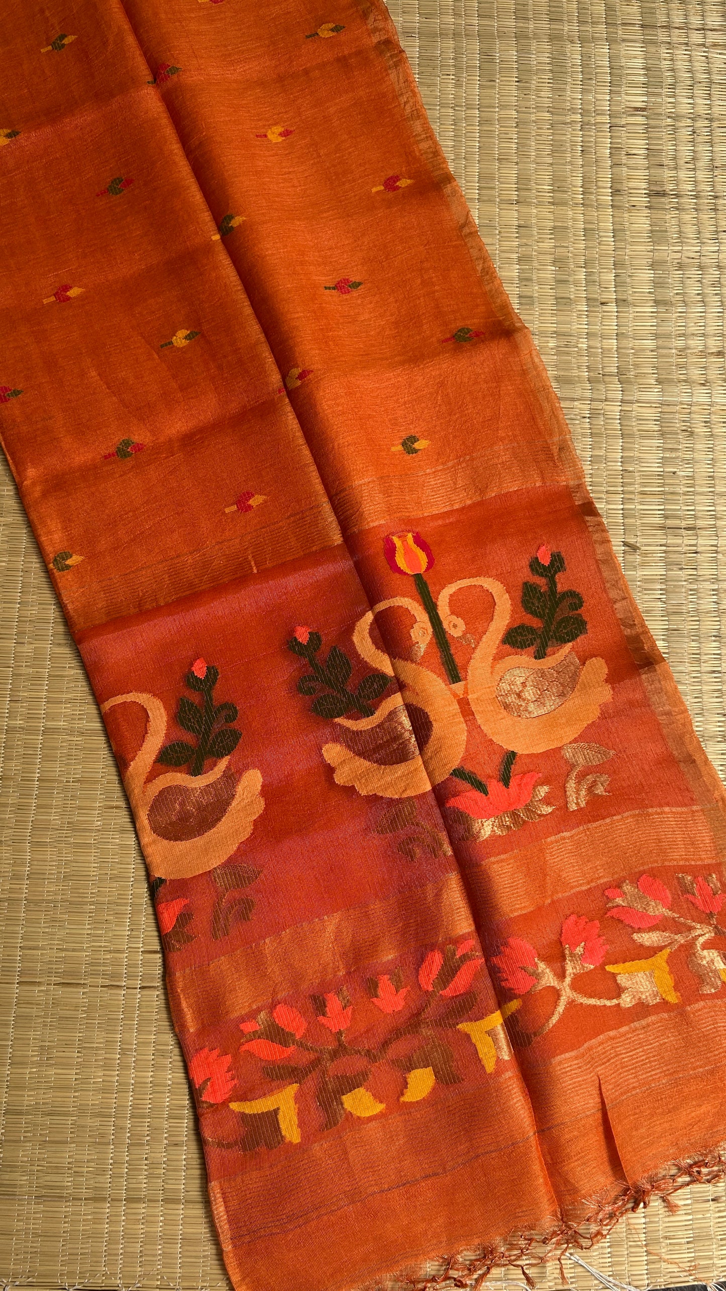 Orange silk linen jamdani saree with swan motifs - with handloom mark
