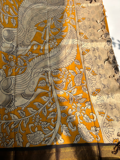 Yellow chennur silk kalamkari saree with Nizam border