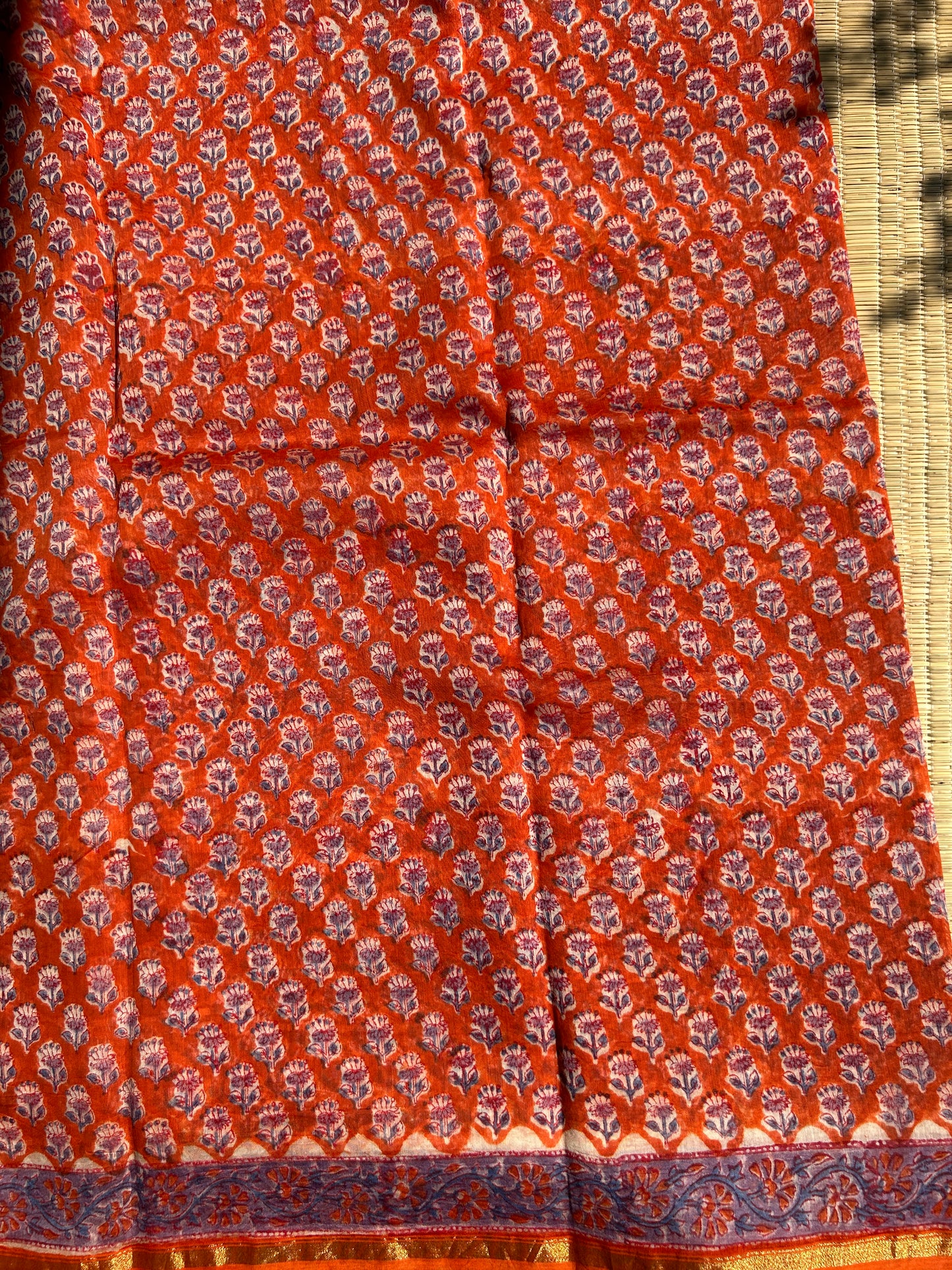 Orange Chanderi silk saree with small florals