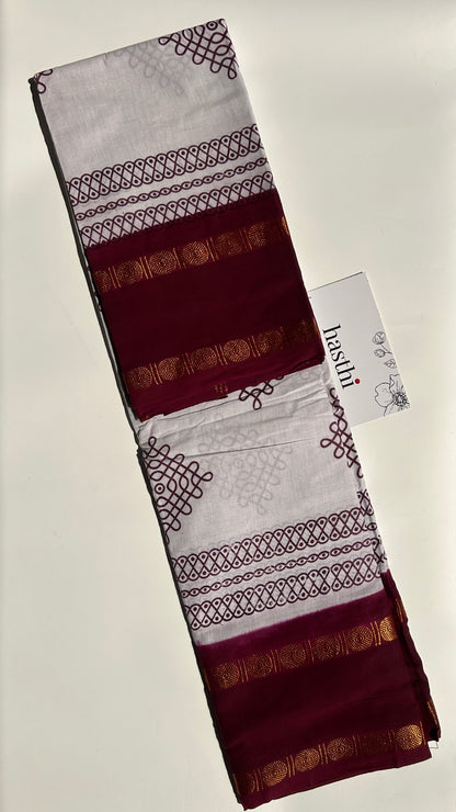 White & Maroon Madurai sungudi cotton saree with kolam motif