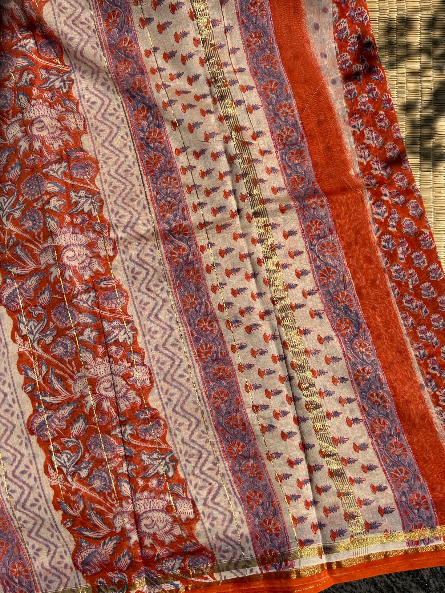 Orange Chanderi silk saree with small florals