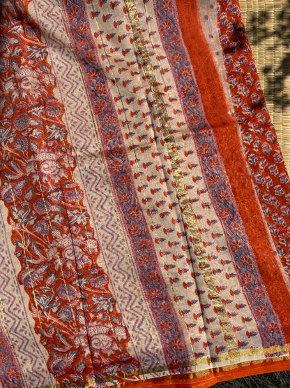 Orange Chanderi silk saree with small florals