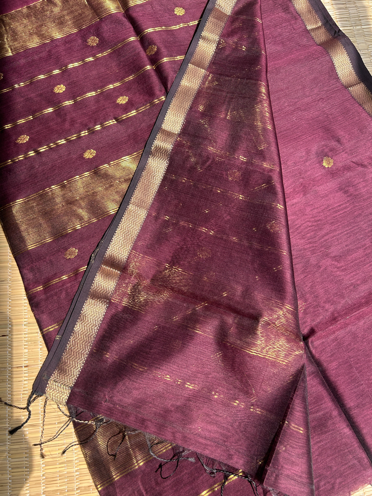 Brown Maheshwari handloom saree with flower motifs