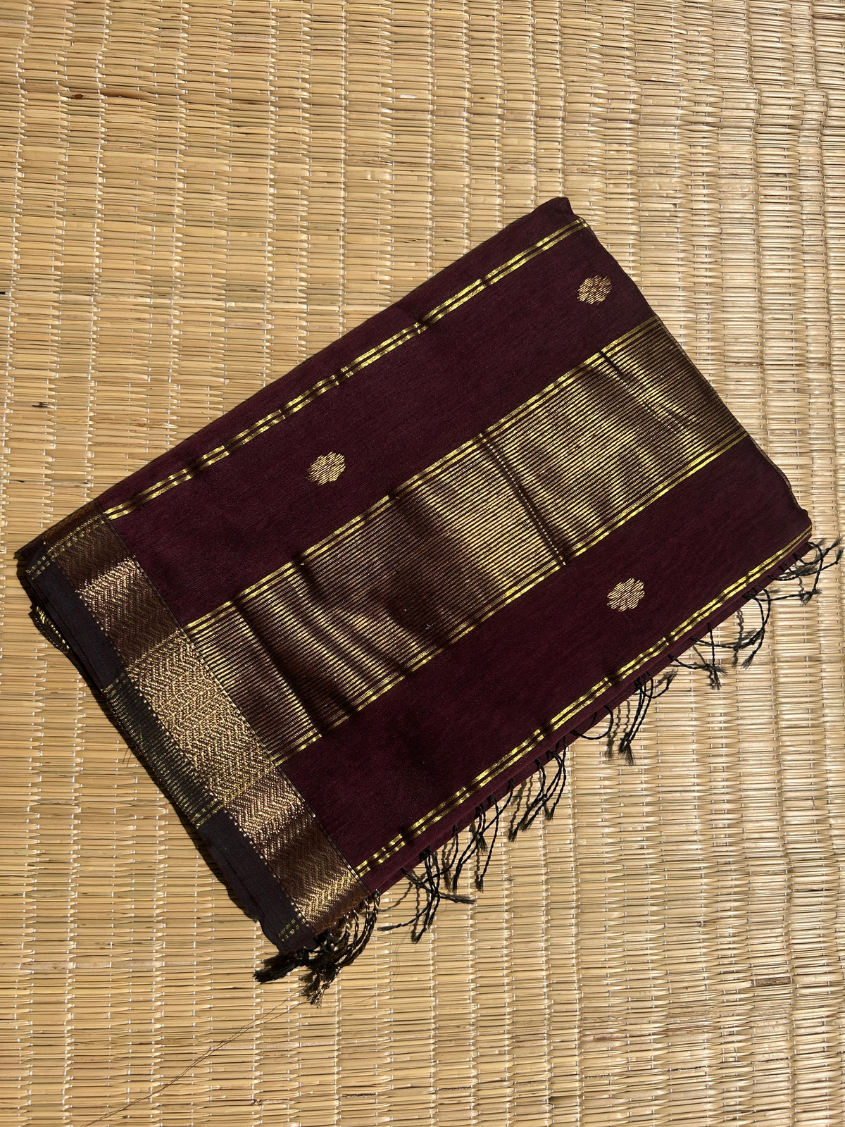 Brown Maheshwari handloom saree with flower motifs