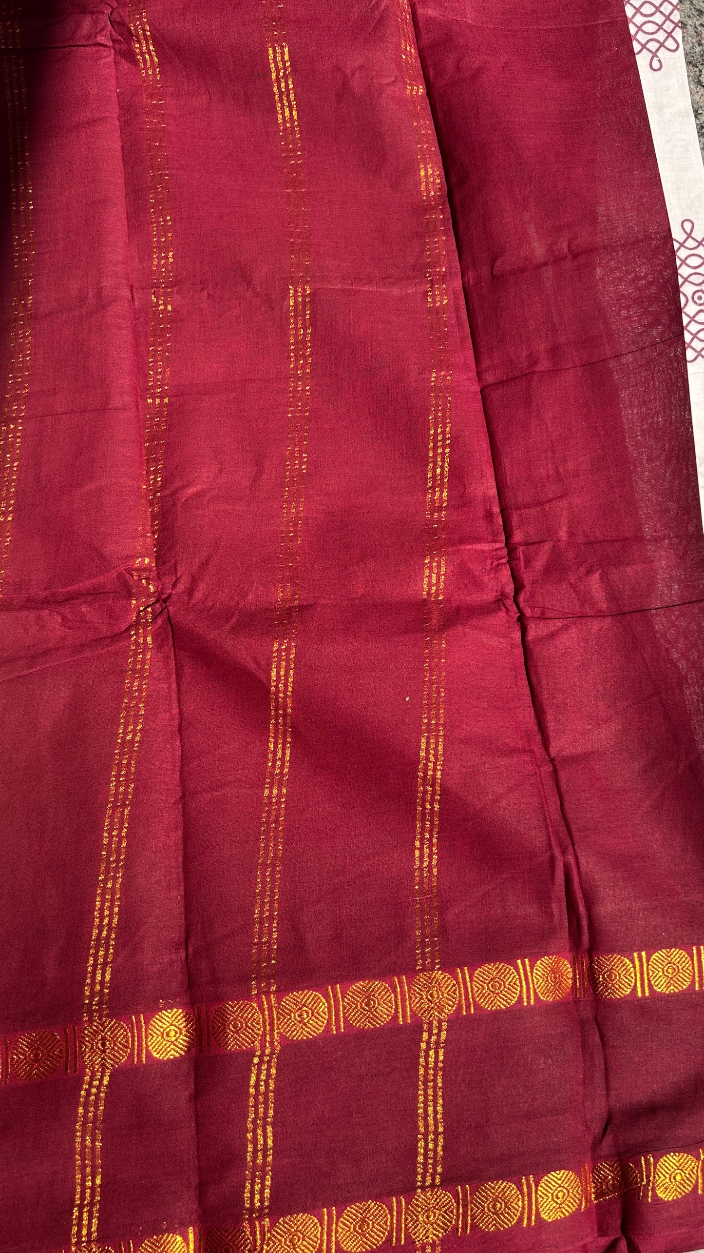 White & Maroon Madurai sungudi cotton saree with kolam motif