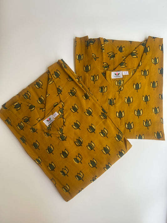 Mustard yellow corset kurti with lotus motifs