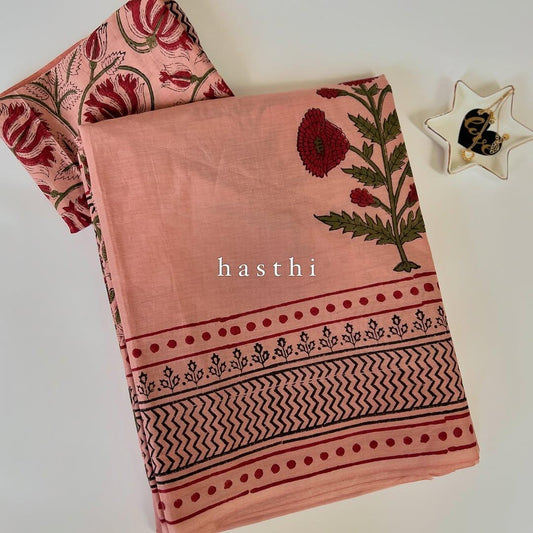 Peach blockprint mul cotton saree with big red floral motifs